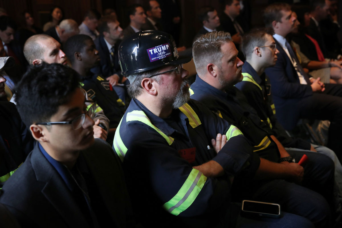 Coal miners attend a signing ceremony where Environmental Protection Agency Administrator Scott Wheeler signed the Affordable Clean Energy final rule at EPA headquarters June 19, 2019, in Washington, D.C.