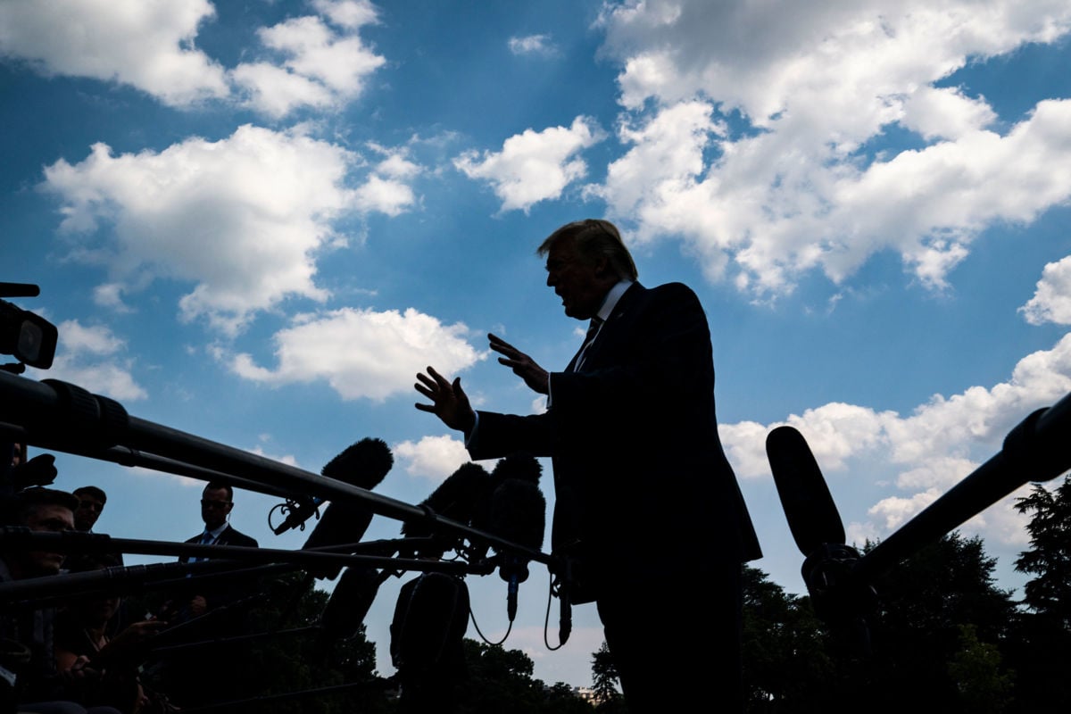 President Trump stops to talk to reporters and members of the media as he walks from the Oval Office to board Marine One on July 19, 2019, in Washington, D.C.