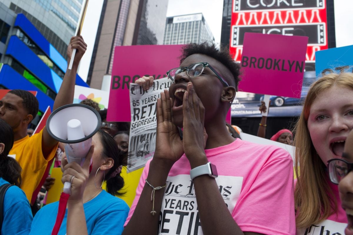 High school students from New York City's public high schools demonstrate against a segregated school system on May 17, 2019, in Times Square, New York City. New York City has some of the most segregated schools in the nation, and black and latino students continue to be vastly underrepresented at the city's elite public high schools.