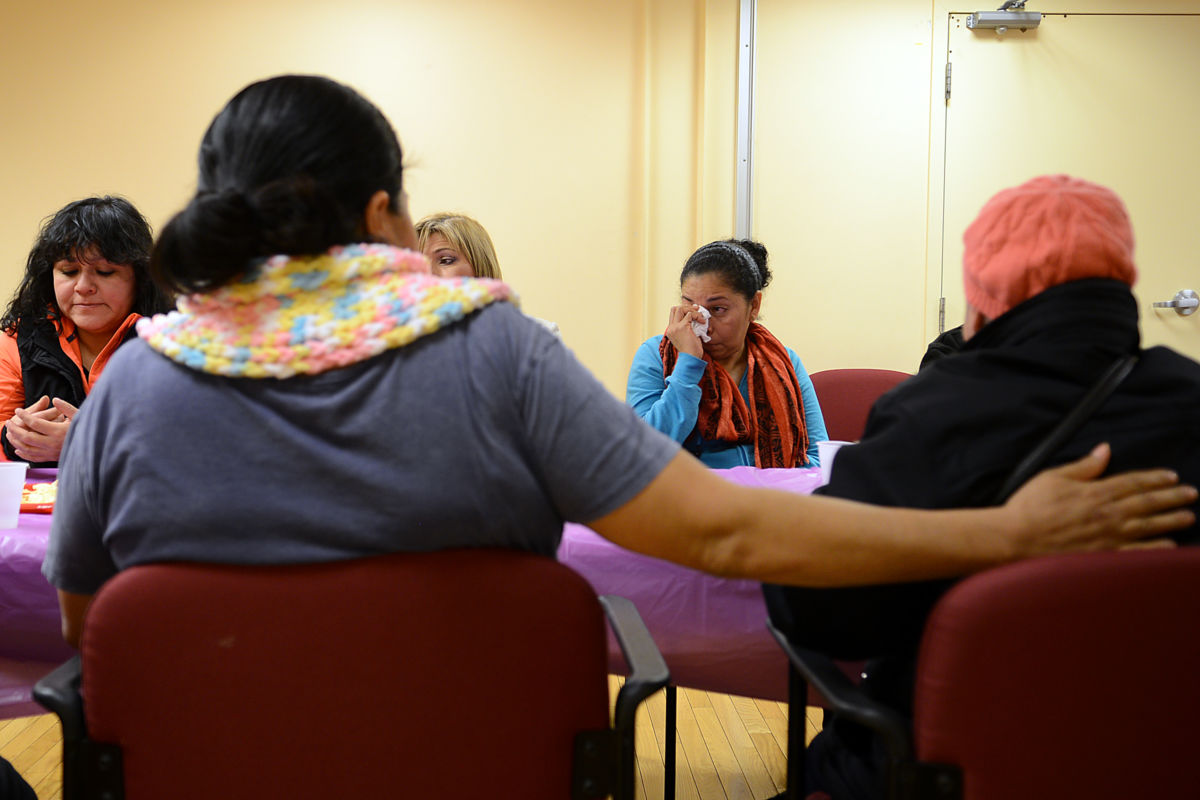 Immigrant women who are victims of violence and domestic abuse talk about their abuse during a weekly meeting at La Clinica Del Pueblo in Columbia Heights, Washington, D.C., on November 22, 2013. The Violence Against Women Act implicitly recognizes the imbalance of power in mixed-status interactions.