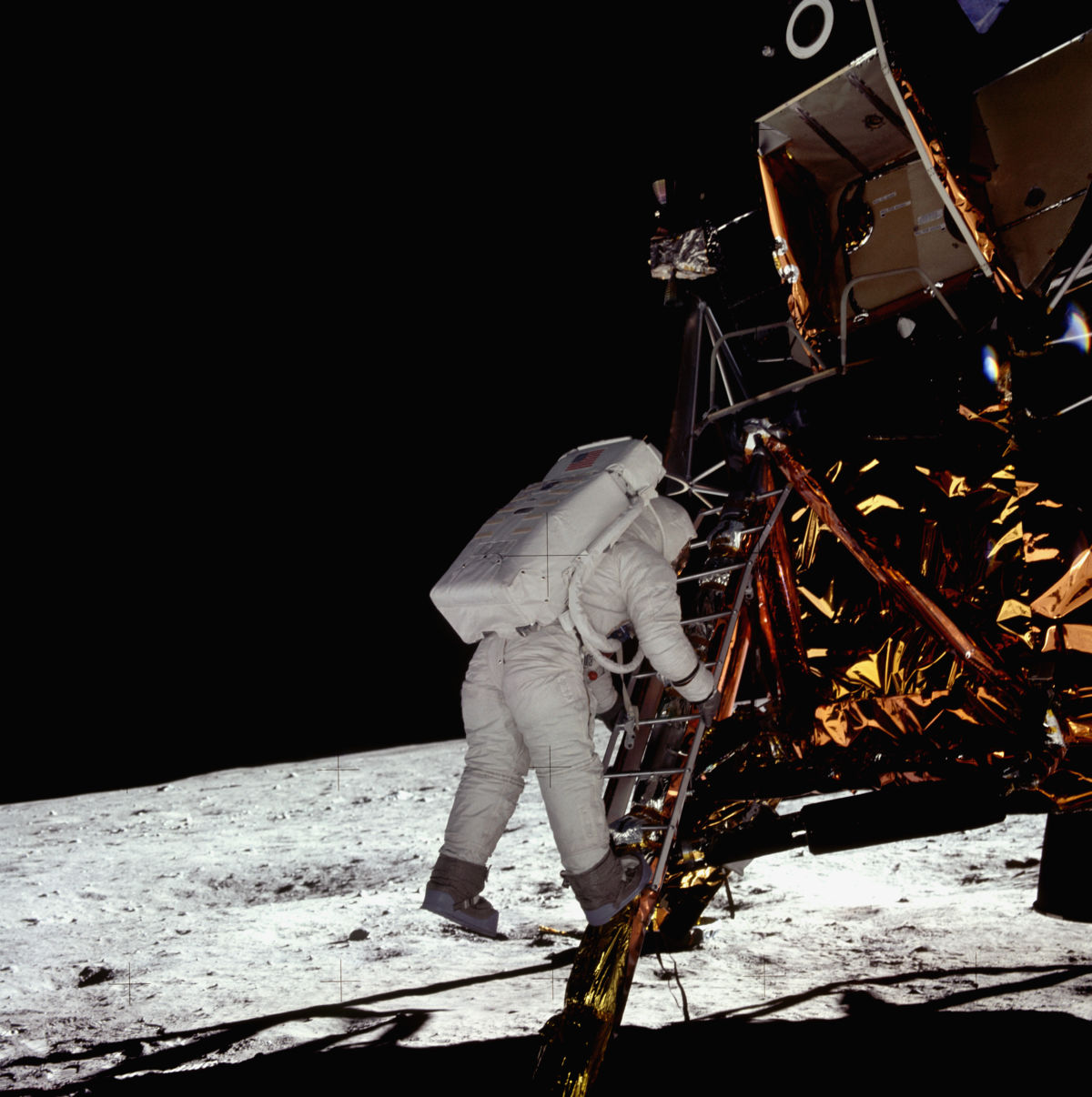 Apollo 11 astronaut Buzz Aldrin takes his last step off the Eagle lunar module onto the surface of the Moon.