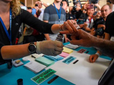 Guatemalan candidate for the Vamos party, Alejandro Giammattei, votes at a polling station in Guatemala City on June 16, 2019, during general elections.