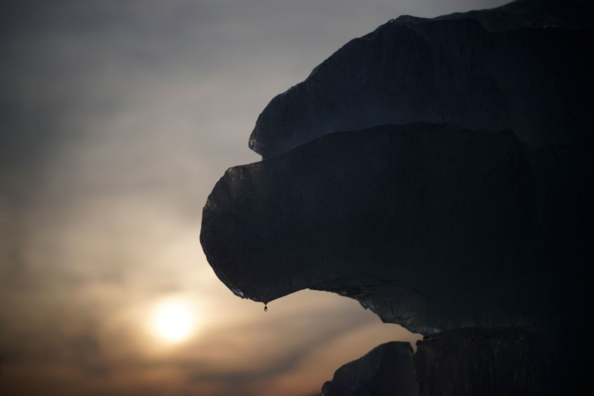 water drips off of a hunk of sculpted ice