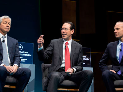 JPMorgan Chase & Co. CEO Jamie Dimon (L), AT&T CEO Randall Stephenson (C) and Boeing CEO Dennis Muilenberg (R) speak during the Business Roundtable (BRT) CEO Innovation Summit