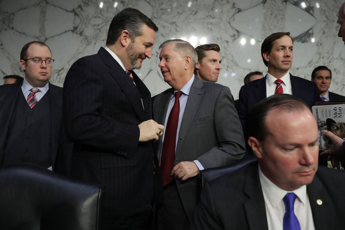 A group of 21 Republicans led by Sen. Ted Cruz (2nd L) wrote a letter pushing for a move that would save wealthy investors billions of dollars a year.