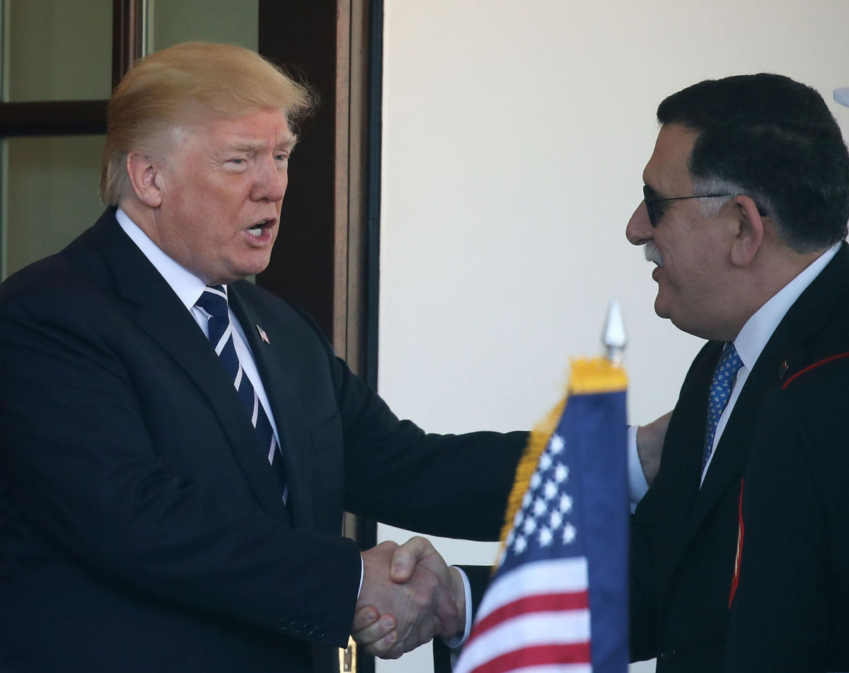 President Trump greets Prime Minister Fayez al-Sarraj of Libya upon his arrival for a meeting at the West Wing of the White House on December 1, 2017, in Washington, D.C. Al-Sarraj is the prime minister of the U.N.-backed government in Libya that oversees the Libyan Investment Authority.