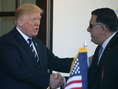 President Trump greets Prime Minister Fayez al-Sarraj of Libya upon his arrival for a meeting at the West Wing of the White House on December 1, 2017, in Washington, D.C. Al-Sarraj is the prime minister of the U.N.-backed government in Libya that oversees the Libyan Investment Authority.