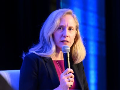 Rep. Abigail Spanberger speaks into a microphone