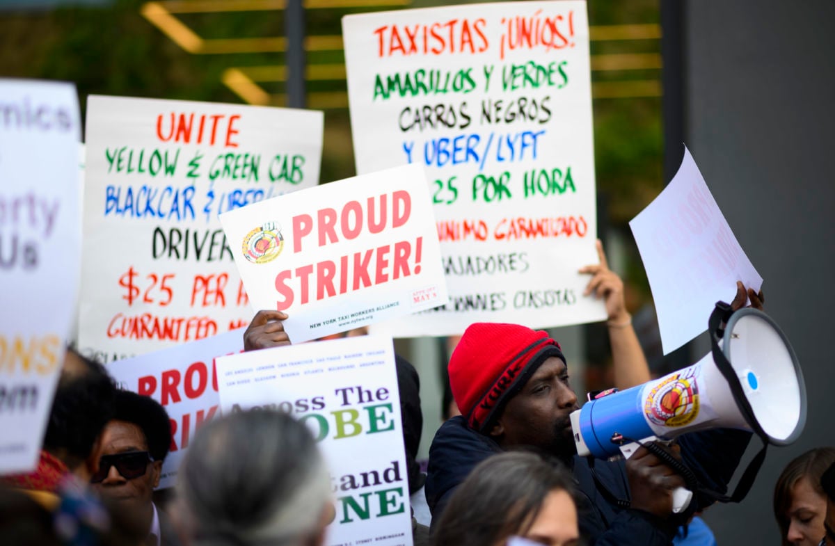 Drivers take part in a rally demanding more job security and livable incomes, at Uber and Lyft New York City Headquarters on May 8, 2019.