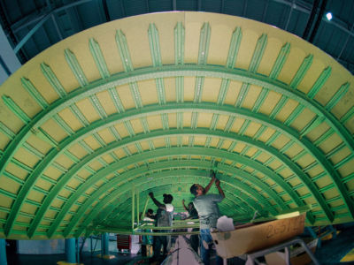 Engineers work on the Boeing 747-400 production line.