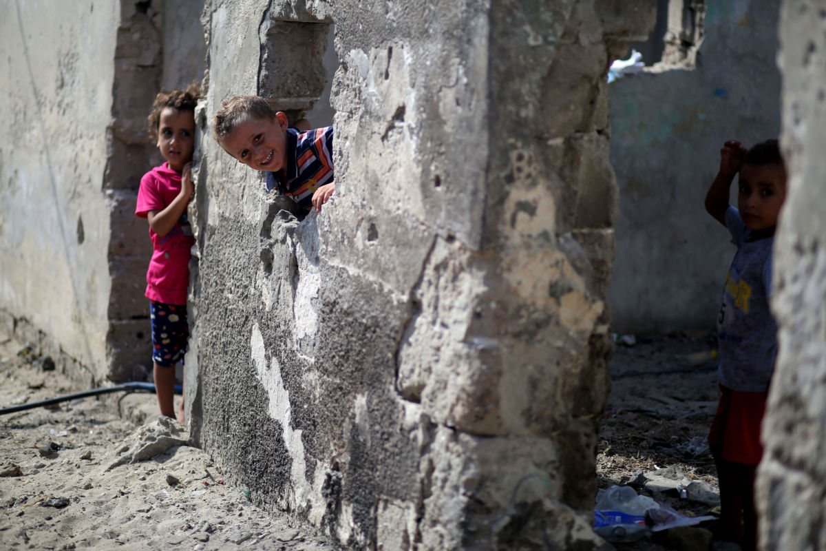 Children play in a deserted house at the Shati Palestinian refugee camp in Gaza City, on September 3, 2019.