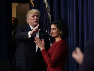 President Trump acknowledges the audience as Administrator of the Centers for Medicare and Medicaid Services Seema Verma looks on at the Eisenhower Executive Office Building, January 18, 2018, in Washington, D.C.