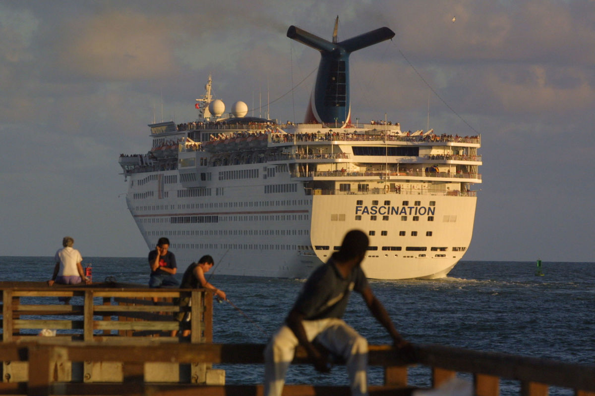 The Carnival Corp. cruise ship Fascination sets sail December 17, 2001, in Miami, Florida.