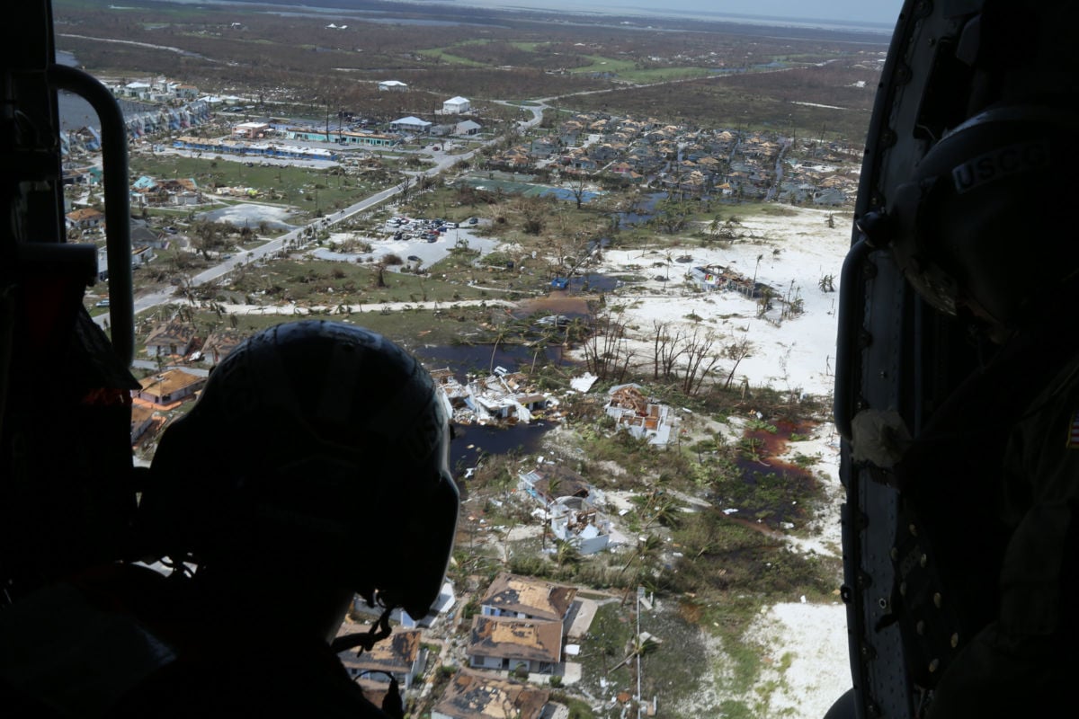 Mike Lewis of the U.S. Coast Guard inspects areas damaged by Hurricane Dorian in support of search-and-rescue efforts and humanitarian aid in the Bahamas on September 4, 2019.