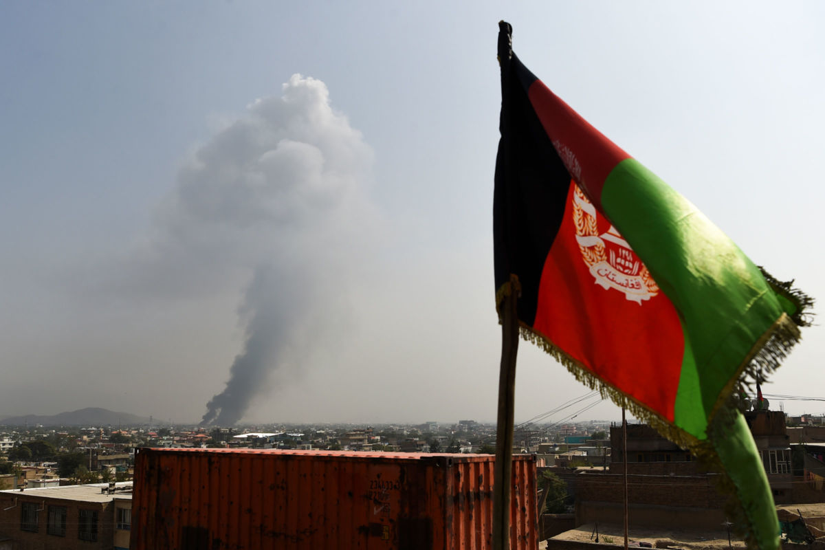 Smoke rises from the site of an attack after a massive explosion the night before near the Green Village in Kabul, Afghanistan, on September 3, 2019.