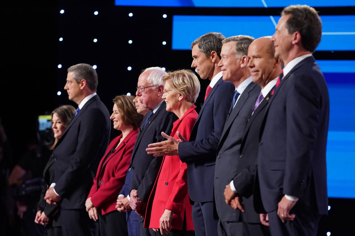 Democratic presidential candidates take the stage at the beginning of the Democratic Presidential Debate at the Fox Theatre July 30, 2019, in Detroit, Michigan.