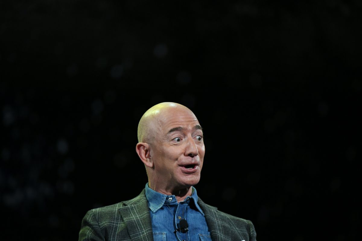 Jeff Bezos makes a face while speaking emphatically about colonizng Mars