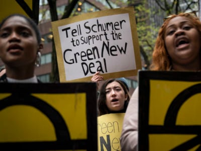 Activists rally in support of proposed "Green New Deal" legislation outside of Senate Minority Leader Chuck Schumer's New York City office, April 30, 2019 in New York City.