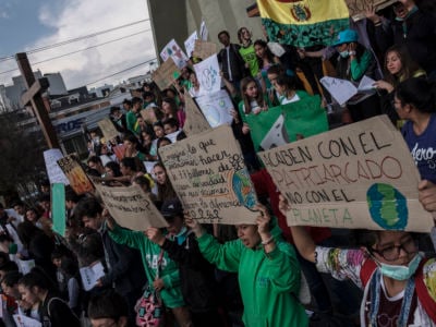 Children hold posters during the strike "Fridays for Future" in La Paz, Bolivia. Also in Bolivia, forests burn in the plains of the Chiquitanía region near the borders to Brazil and Paraguay. Numerous demonstrators follow the call of the movement Fridays for Future and want to fight for more climate protection.