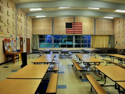 A photo of a school cafeteria.