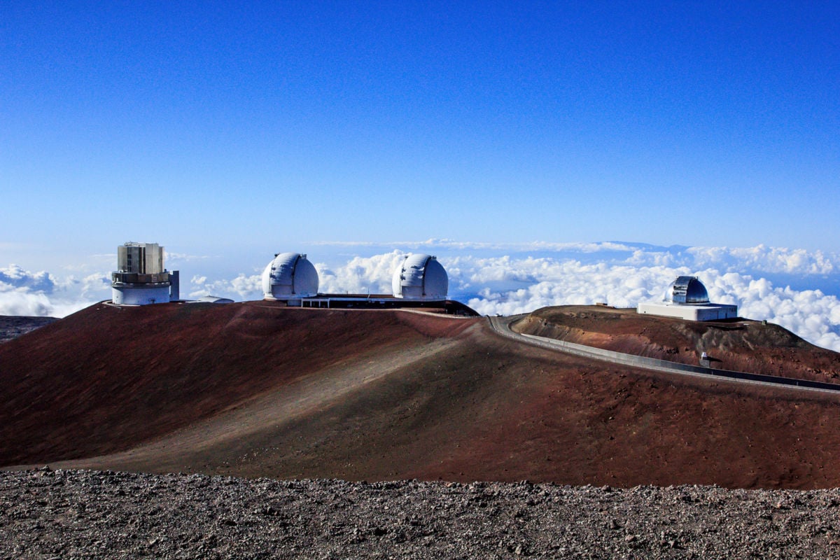 The NASA Infrared Telescope Facility, Keck I, Keck II, and Subaru Telescopes at the Mauna Kea Observatories in Hawaii, pictured in 2012.