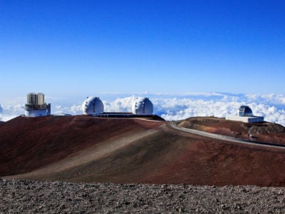 The NASA Infrared Telescope Facility, Keck I, Keck II, and Subaru Telescopes at the Mauna Kea Observatories in Hawaii, pictured in 2012.