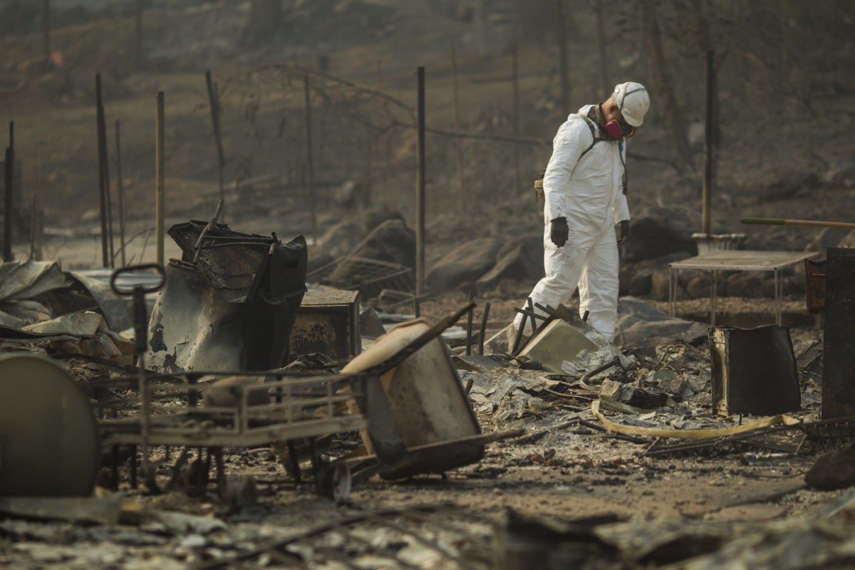 Soldiers from the California Army National Guard's 649th Engineer Company from Chico, California, conduct search and debris-clearing operations on November 17, 2018, in Paradise, California.