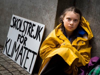 Swedish student Greta Thunberg leads a school strike and sits outside of Riksdagen, the Swedish parliament building, in order to raises awareness for climate change on August 28, 2018, in Stockholm, Sweden.