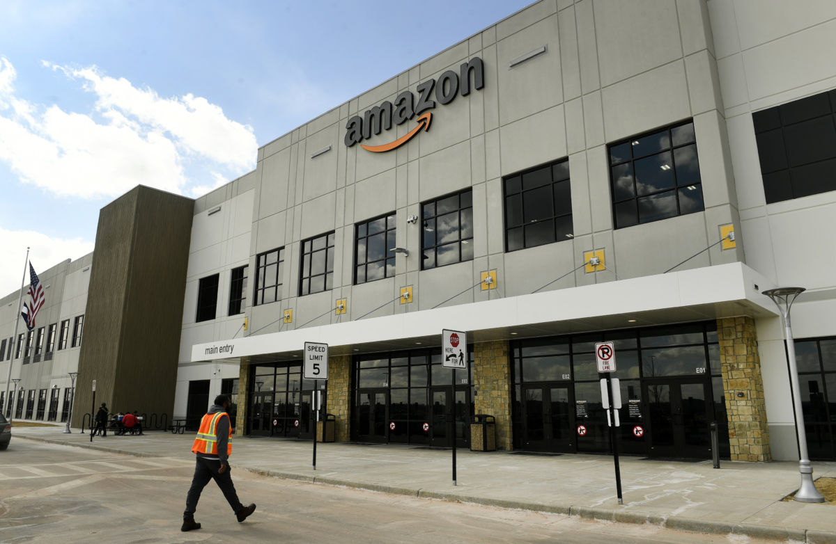An employee returns from lunch at Amazon's Fulfillment Center on March 19, 2019, in Thornton, Colorado.
