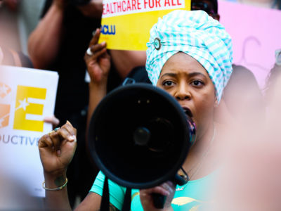 A woman speaks during a protest against recently passed abortion ban bills at the Georgia State Capitol building, on May 21, 2019 in Atlanta, Georgia.