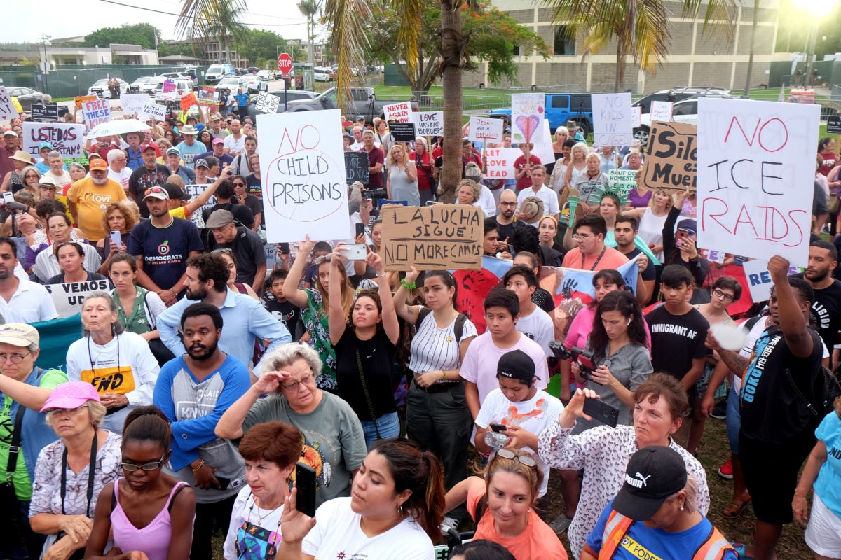 People attend a protest rally and vigil in support of the liberation and reunification of migrant children outside the Homestead Temporary Shelter for Unaccompanied Children, in Homestead, Florida, on July 12, 2019.