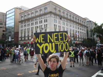 Protesters advocating for new policies to combat global climate change shut down an intersection in Washington, D.C., on September 23, 2019.