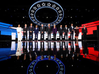 Democratic presidential candidates line the debate stage