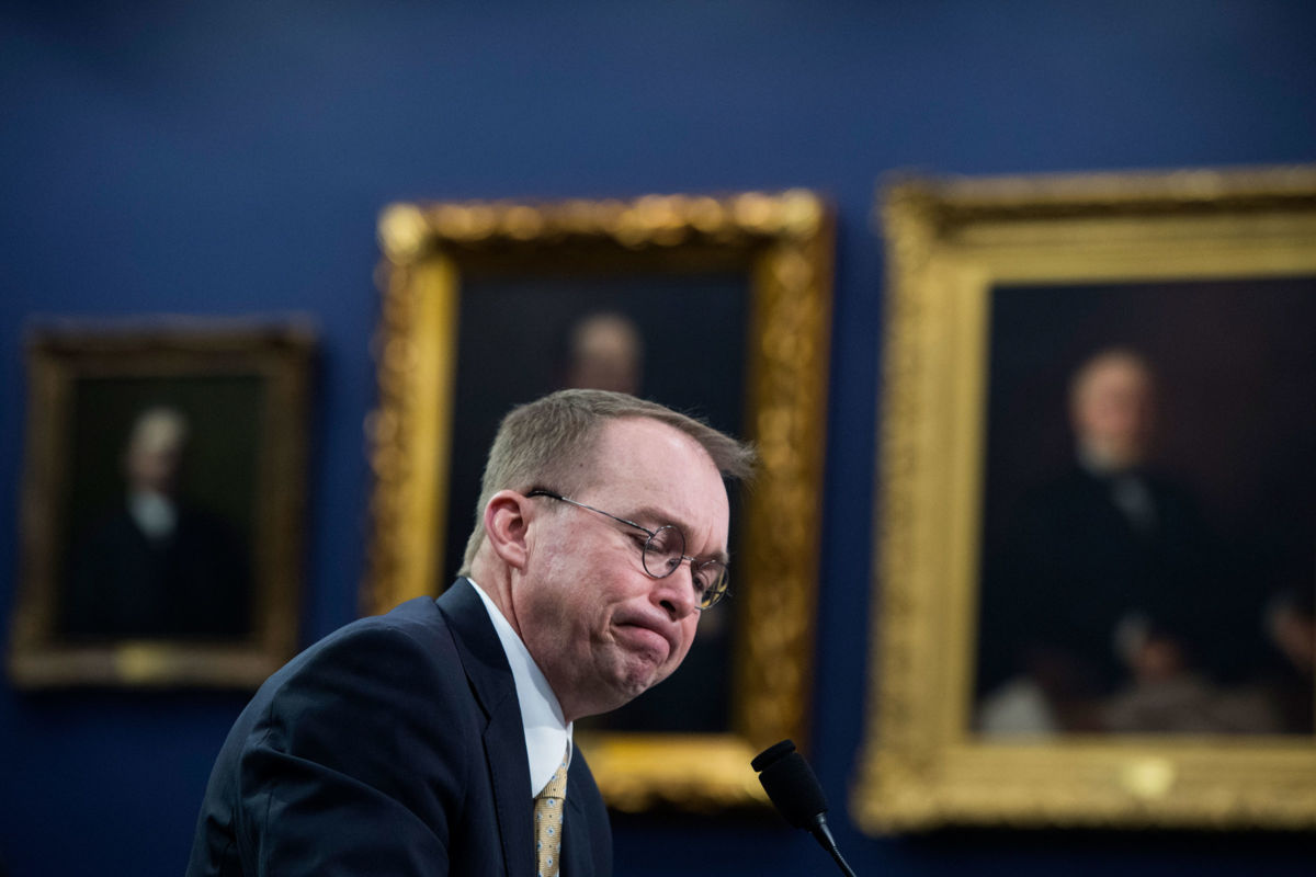 Mick Mulvaney makes a face during a hearing