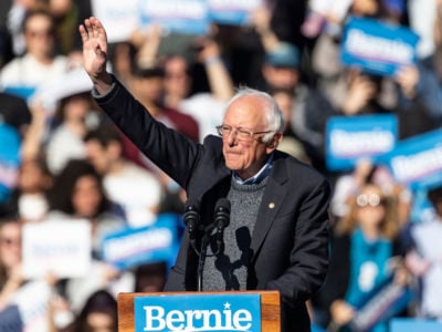 Bernie Sanders waves at the crowd gathered for his campaign rally
