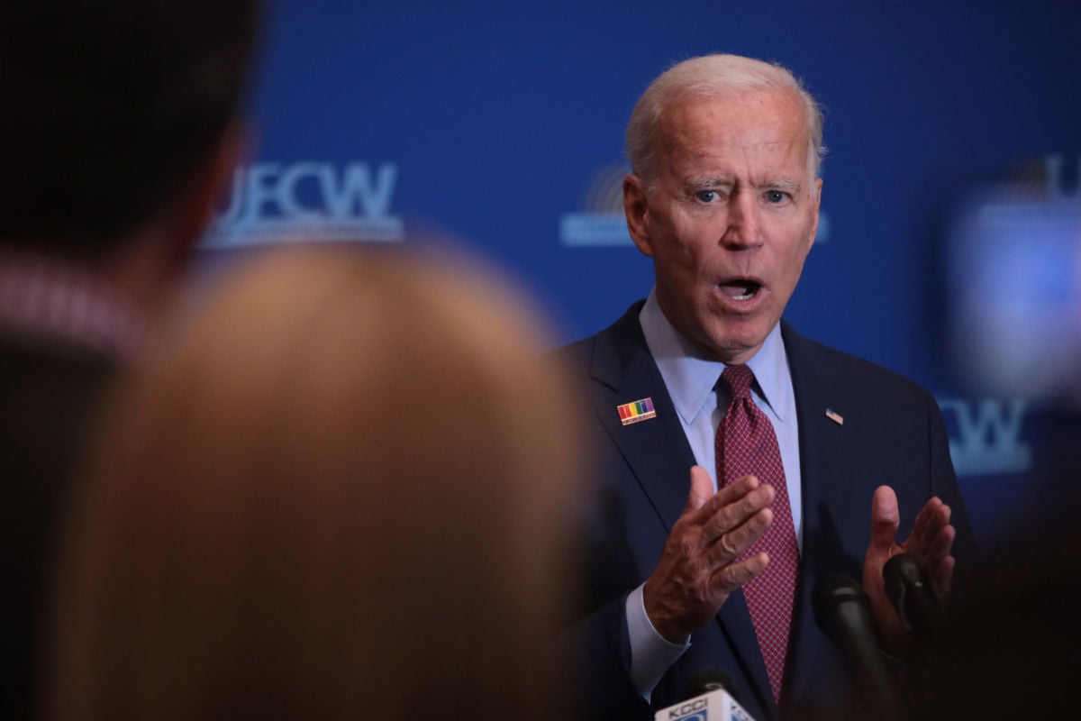Former vice president Joe Biden speaks to the press after addressing the United Food and Commercial Workers' 2020 presidential candidate forum on October 13, 2019, in Altoona, Iowa.