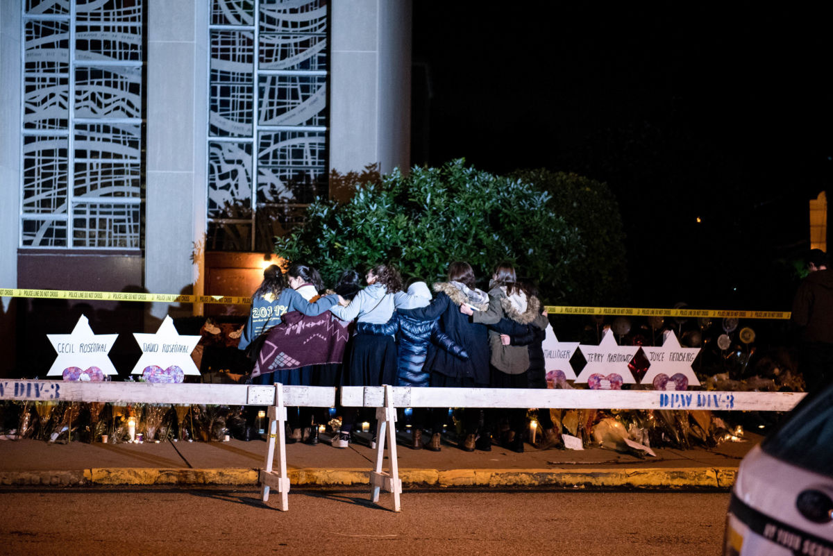 Jewish youth sing together to pay their respect to victims of the shooting at the Tree of Life synagogue in Squirrel Hill, Pittsburgh, Pennsylvania, October 29, 2018.