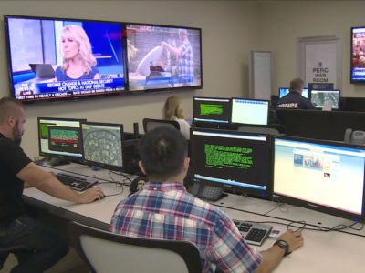 ICE agents at the Pacific Enforcement Resource Center run searches on the fingerprints of people booked into jails to determine if they have probable cause to issue a detainer.