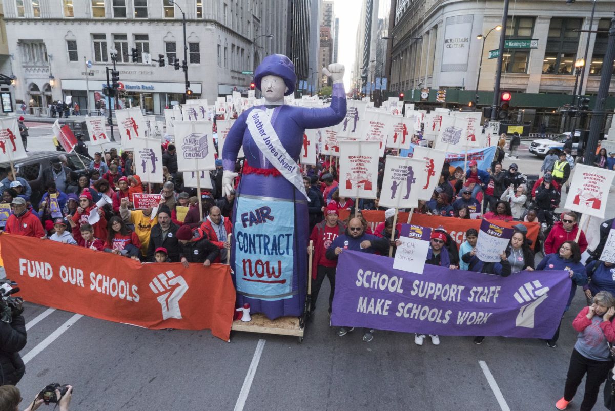 Thousands of Chicago Teachers' Union (CTU) and Service Employees International Union (SEIU) Local 73 members march through downtown Chicago to demand a budget that funds their students and classrooms, October 14, 2019.