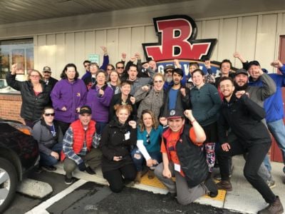 Members of the Burgerville Workers Union -- the first officially recognized fast food workers union in the United States -- rally in front of a Burgerville location in Portland, Oregon.