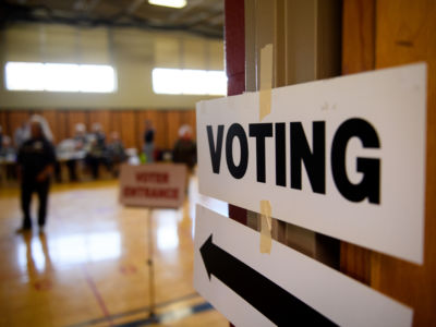 A sign points the way to the polling place at the Franklin Elementary School in Kent, Ohio.