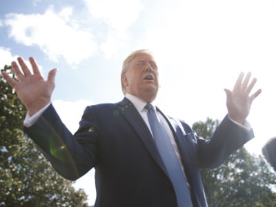 President Donald Trump speaks to the press before boarding Marine One on the South Lawn of the White House on October 4, 2019, in Washington, D.C.