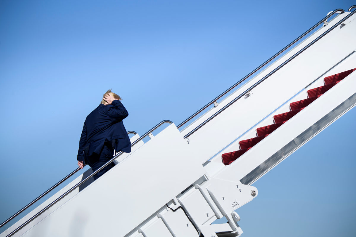 President Trump boards Air Force One at Joint Base Andrews in Maryland