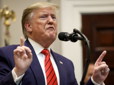 President Trump responds to a question from a reporter at an event for the signing of two executive orders at the White House, October 9, 2019, in Washington, D.C.