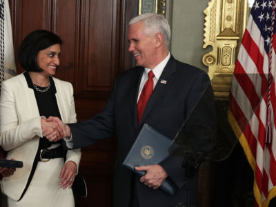 Seema Verma shakes hands with Vice President Mike Pence during a swearing-in ceremony in the Vice President's ceremonial office at Eisenhower Executive Building, March 14, 2017, in Washington, D.C.