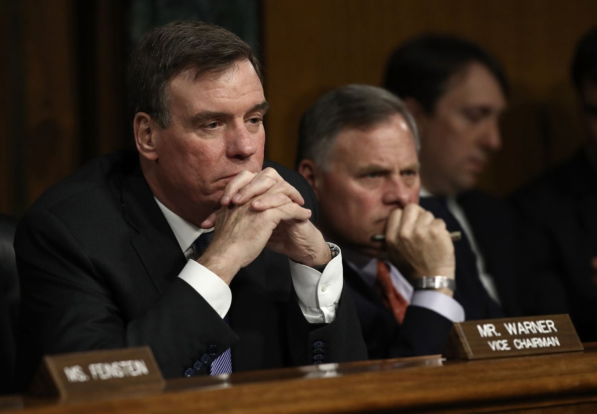 Senate Select Intelligence Committee Chairman Sen. Richard Burr and ranking member Sen. Mark Warner listen to testimony during a hearing on March 30, 2017, in Washington, D.C., on Russian interference during the 2016 election. The Committee recently released a second report calling for sweeping efforts to prevent Russian interference in the 2020 election.