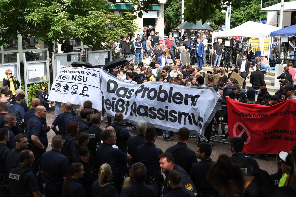 Anton 11:22 AM Anti-fascist and anti-racist activists take part in a protest outside the Higher Regional Court in Munich, Germany, on July 11, 2018.