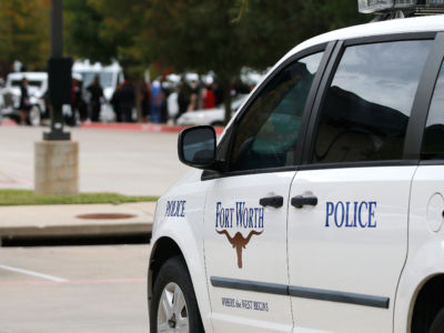 A Fort Worth Police car is parked outside the funeral service for Atatiana Jefferson on October 24, 2019, at Concord Church in Dallas, Texas.