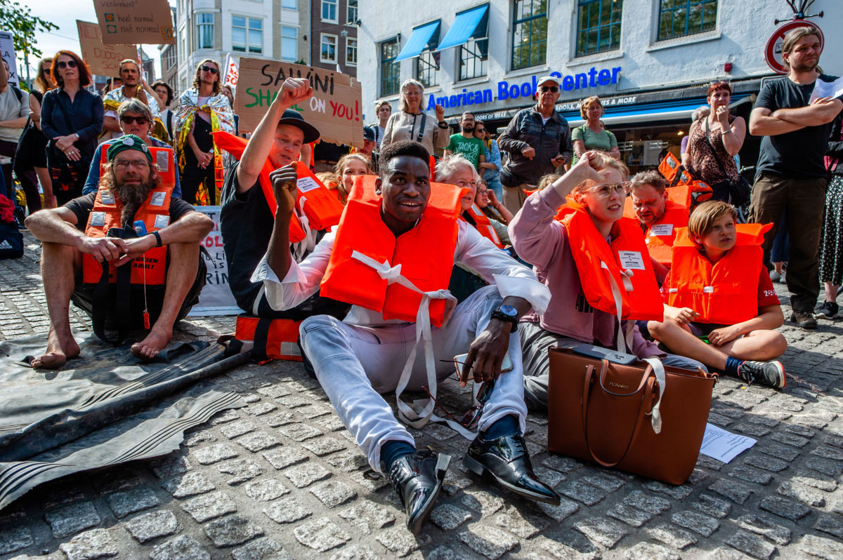 Hundreds gather in Amsterdam in solidarity with Carola Rackete, captain of the Sea-Watch 3 ship, who was arrested after a two-week standoff with Italian officials, in Amsterdam, July 4, 2019.