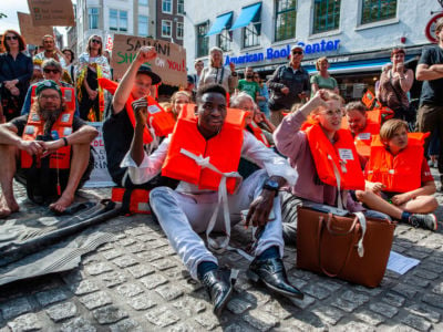 Hundreds gather in Amsterdam in solidarity with Carola Rackete, captain of the Sea-Watch 3 ship, who was arrested after a two-week standoff with Italian officials, in Amsterdam, July 4, 2019.